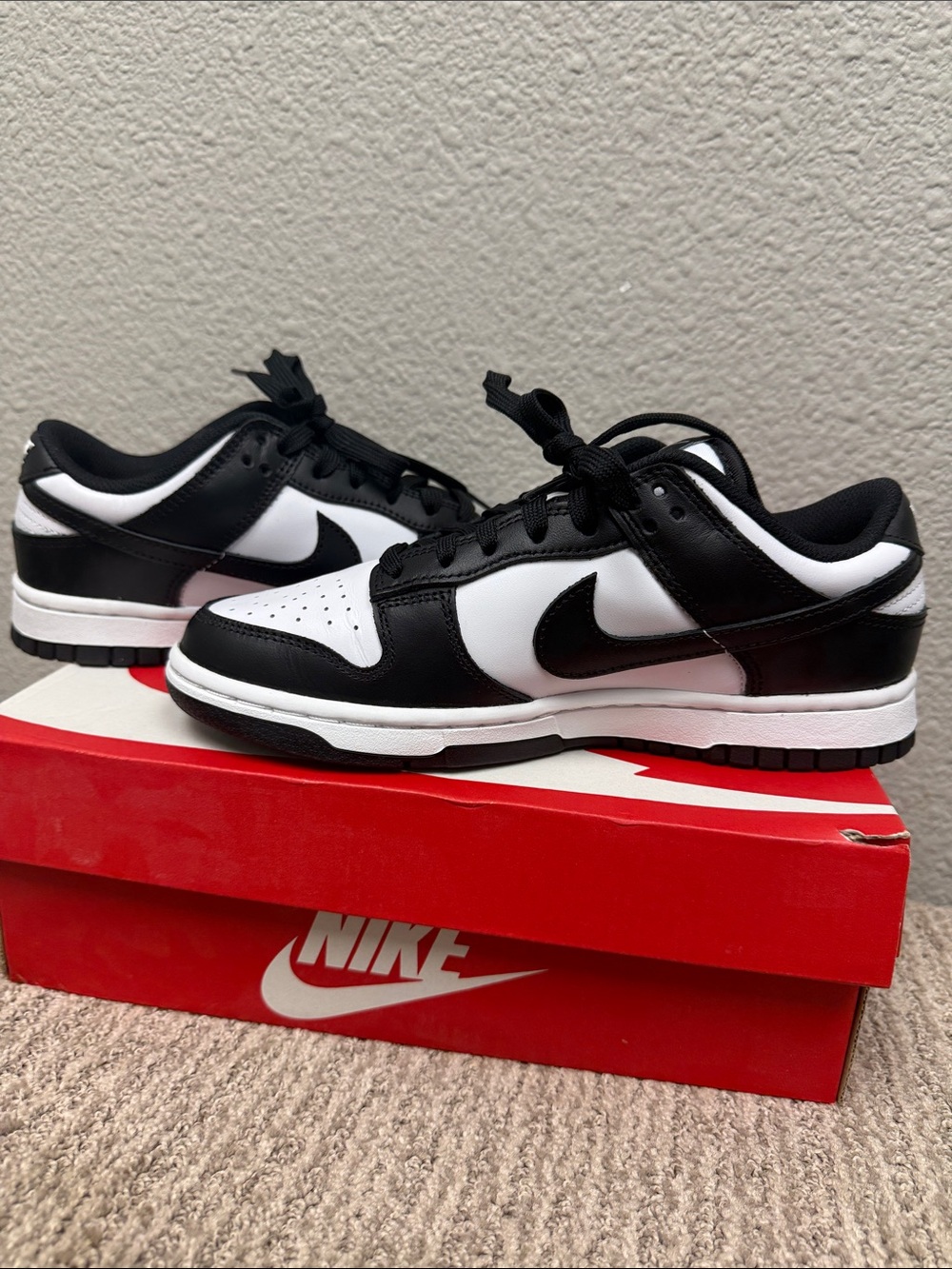 Nike Womenās Dunk Low Black and White Low-Top Sneakers